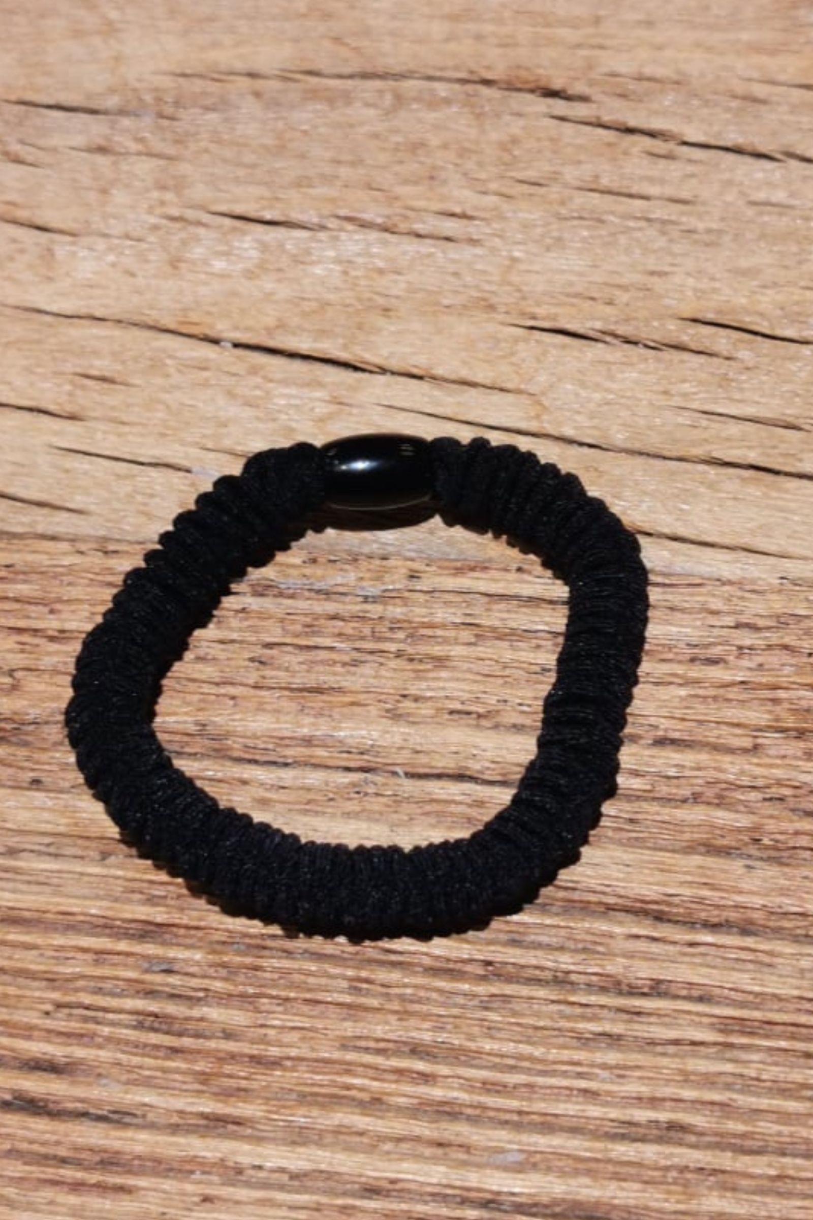 etiket næve Rute Hårelastik i ensfarvet sort stof – Copenhagen Luxe – Copenhagen Luxe